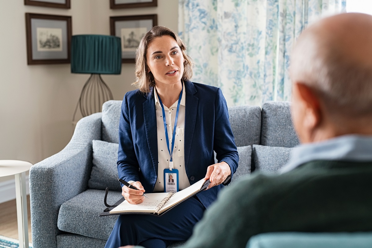 social worker interviewing a senior at home